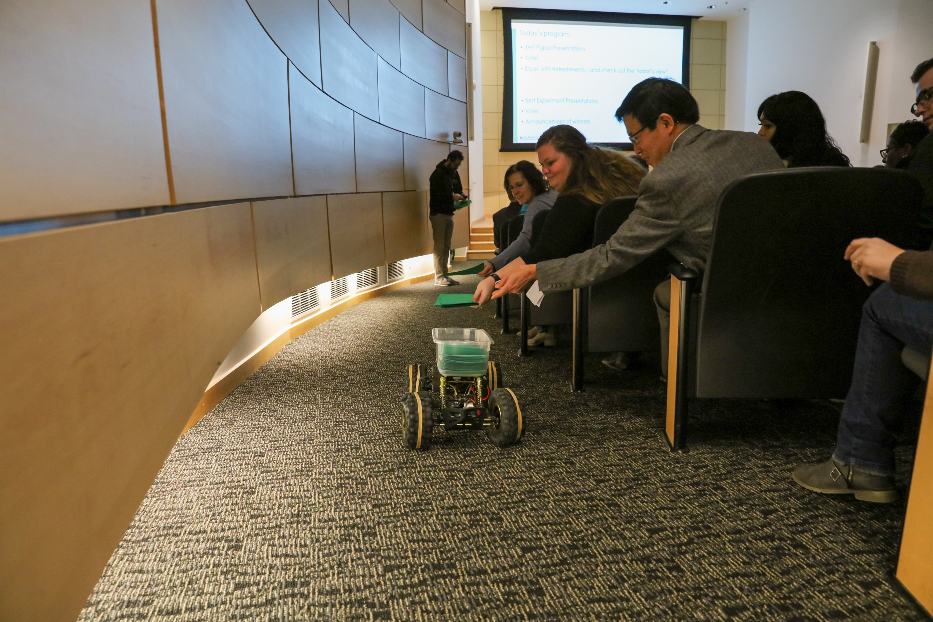 A robot collected attendees’ ballots for best research paper and best experiment at the inaugural Neutron Scattering Division awards ceremony. 