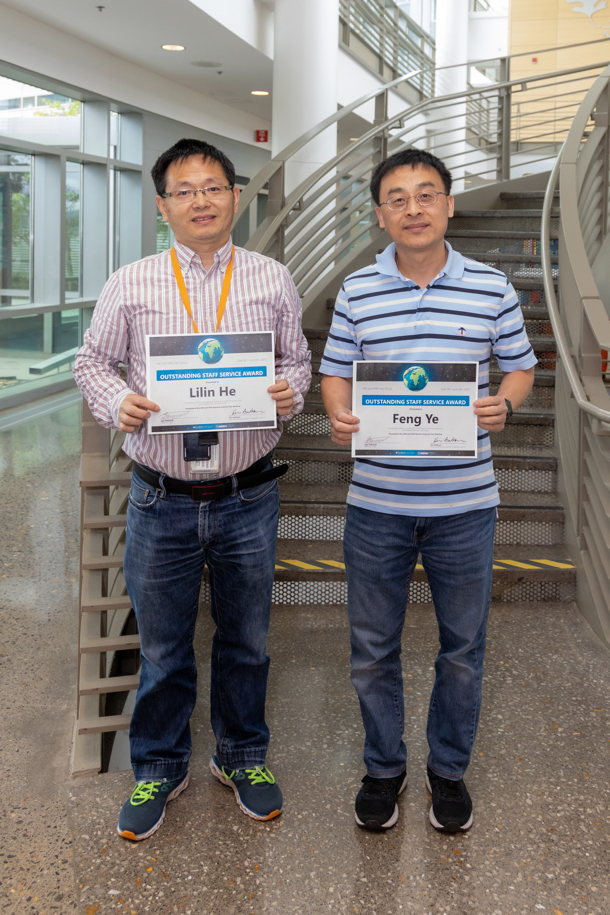 Recipients of 2023 Outstanding Staff Service Award: Lilin He (left), Instrument Scientist for CG-2 GP-SANS at HFIR, and Feng Ye, Instrument Scientist for BL-9 CORELLI at SNS.