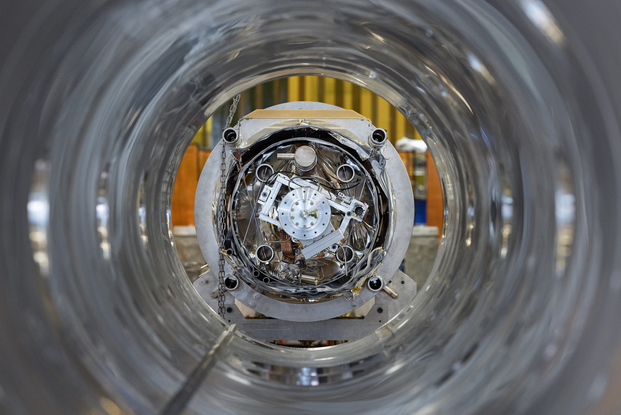 A look down the empty barrel of a cryomodule inside the SRF Institute at Jefferson Lab.