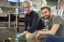 Doug Abernathy, left, ARCS instrument scientist at Oak Ridge National Laboratory, and Marc Janoschek, Los Alamos National Laboratory, prepare their sample for experiments at the Spallation Neutron Source. Credit: Genevieve Martin/ORNL. 