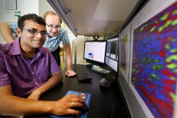 ORNL’s Sergei Kalinin and Rama Vasudevan (foreground) use scanning probe microscopy to study bulk fe