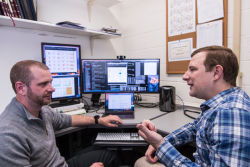 Marc Janoschek, left, and David Fobes discuss features of quantum materials. (Image Credit: Los Alamos National Laboratory)