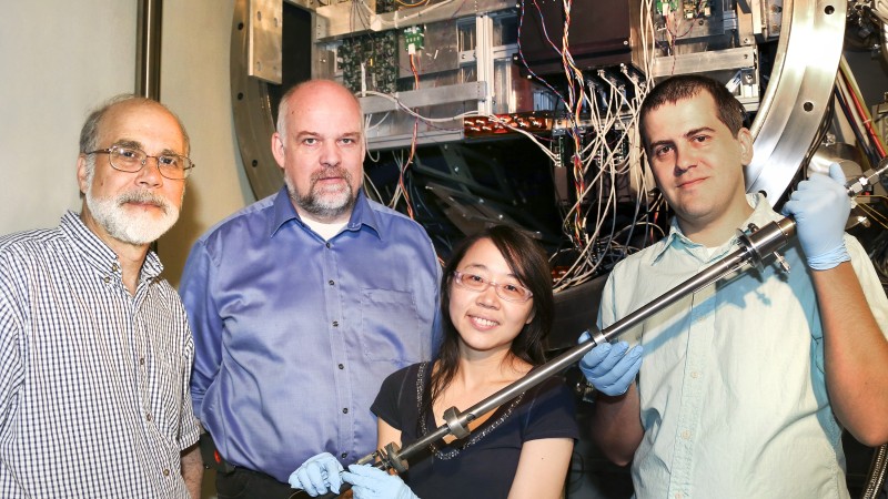 Pictured at the NOMAD instrument at ORNL’s Spallation Neutron Source are David Wesolowski of the Chemical Sciences Division, Thomas Proffen of SNS, Hsiu-Wen Wang of JINS, and NOMAD instrument scientist Mikhail Feygenson. 