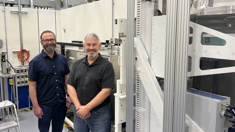 ORNL researchers Josh Pierce (left) and Dean Myles at the High Flux Isotope Reactor’s IMAGINE instru
