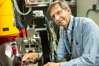 David Yarusso from 3M is studying pressure sensitive adhesives using neutron scattering at the Liquids Reflectometer, SNS beam line 4B.  Image credit: Genevieve Martin/ORNL
