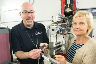 Robert Carter from NASA’s Glenn Research Center (left) and Daira Legzdina from Honeywell Aerospace (right) examined high temperature nickel alloy samples containing linear friction welds using VULCAN, SNS beam line 7. Image credit: Genevieve Martin/ORNL